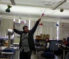 Donald Ch. - UC Davis engineering student holding a static ball and a conductor